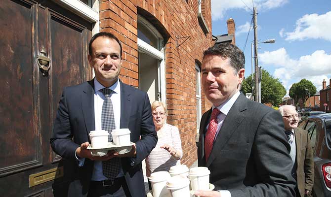 CAPPUCINO CONSERVATIVES: Donohoe and friend pictured here with a peace offering after hurting the bankers’ feelings